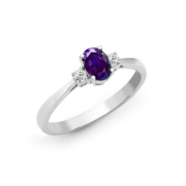 18ct White Gold Diamond And Tanzanite And 3 Stone Ring
